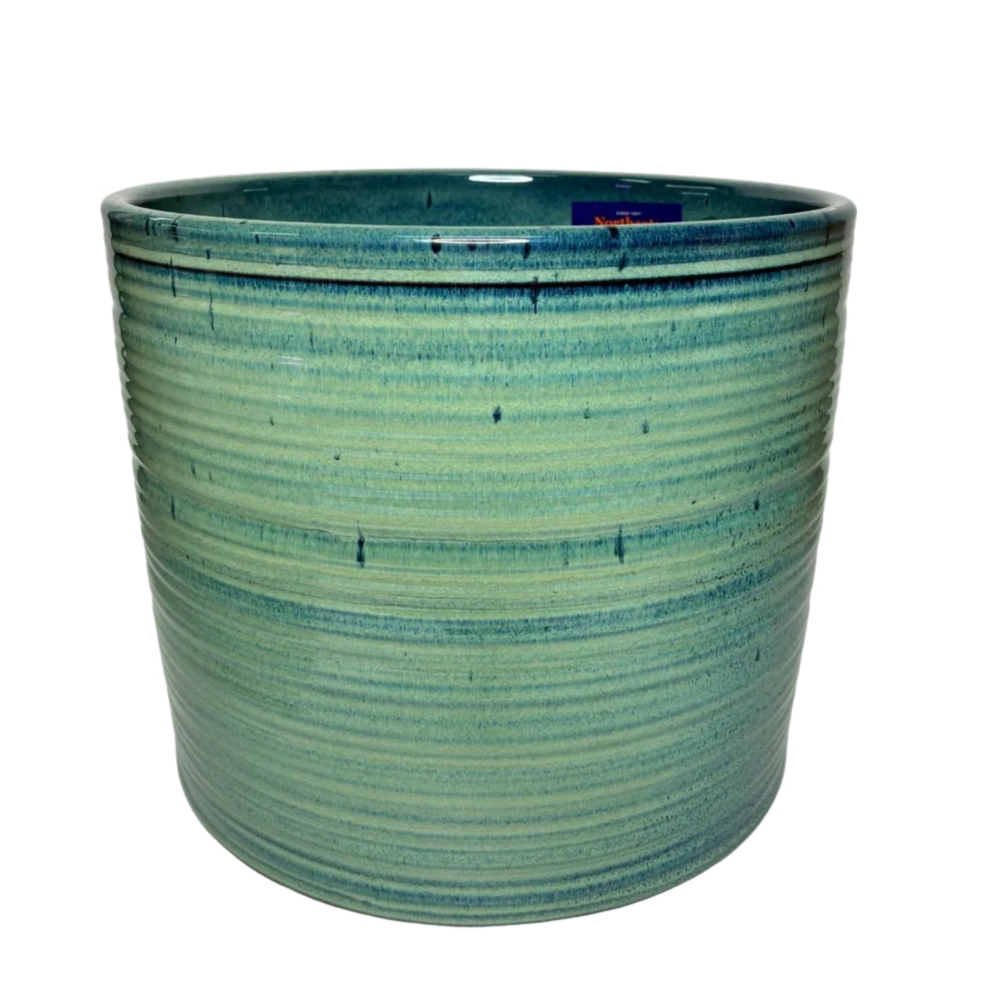 A handmade ceramic planter pot with a wide, flared rim, featuring a textured horizontal ribbed pattern in a gradient of teal, green, and turquoise glaze.