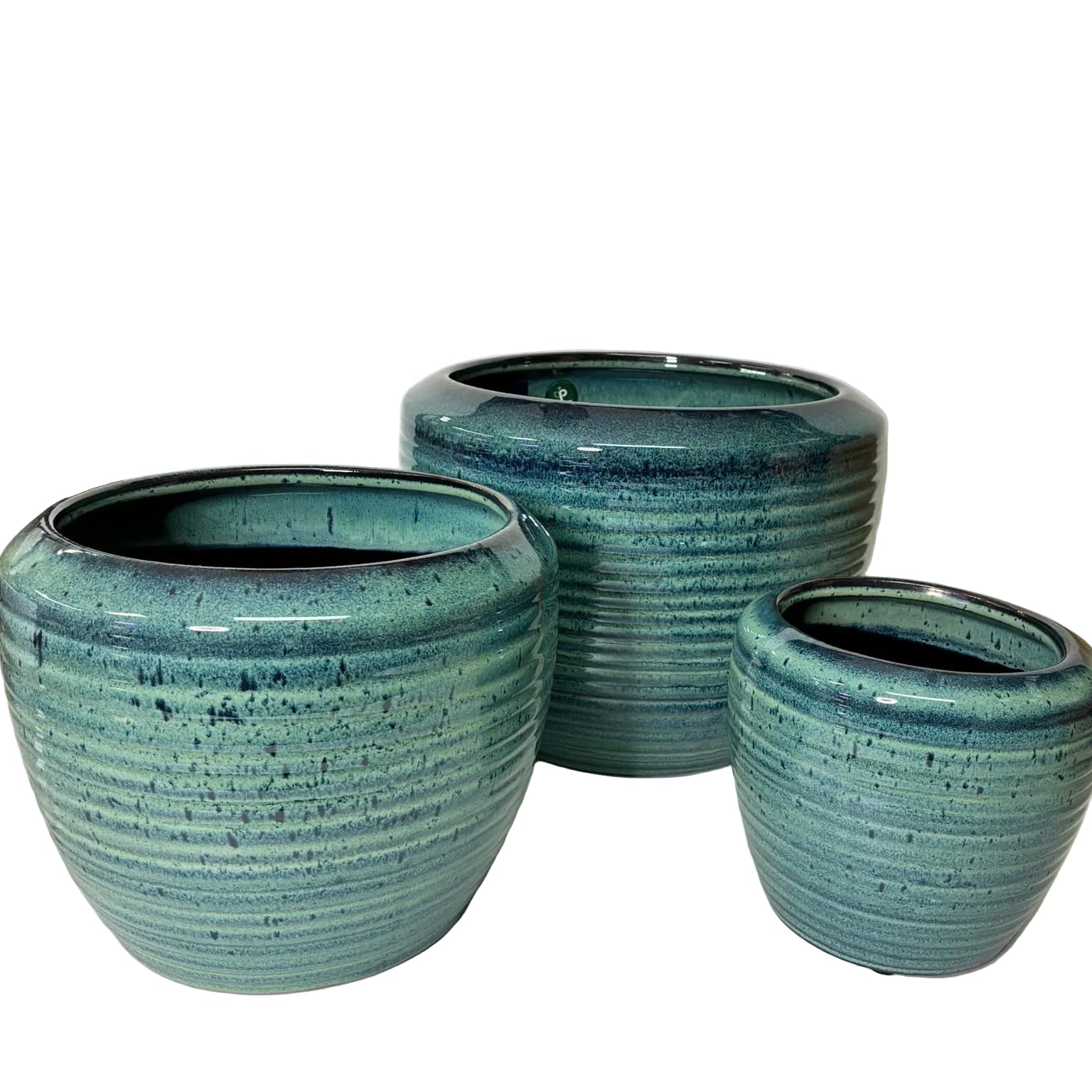 Three ribbed ceramic planters in a tiered set, featuring a glossy teal and turquoise glaze with dark speckled accents, displayed on a white surface against a white background.