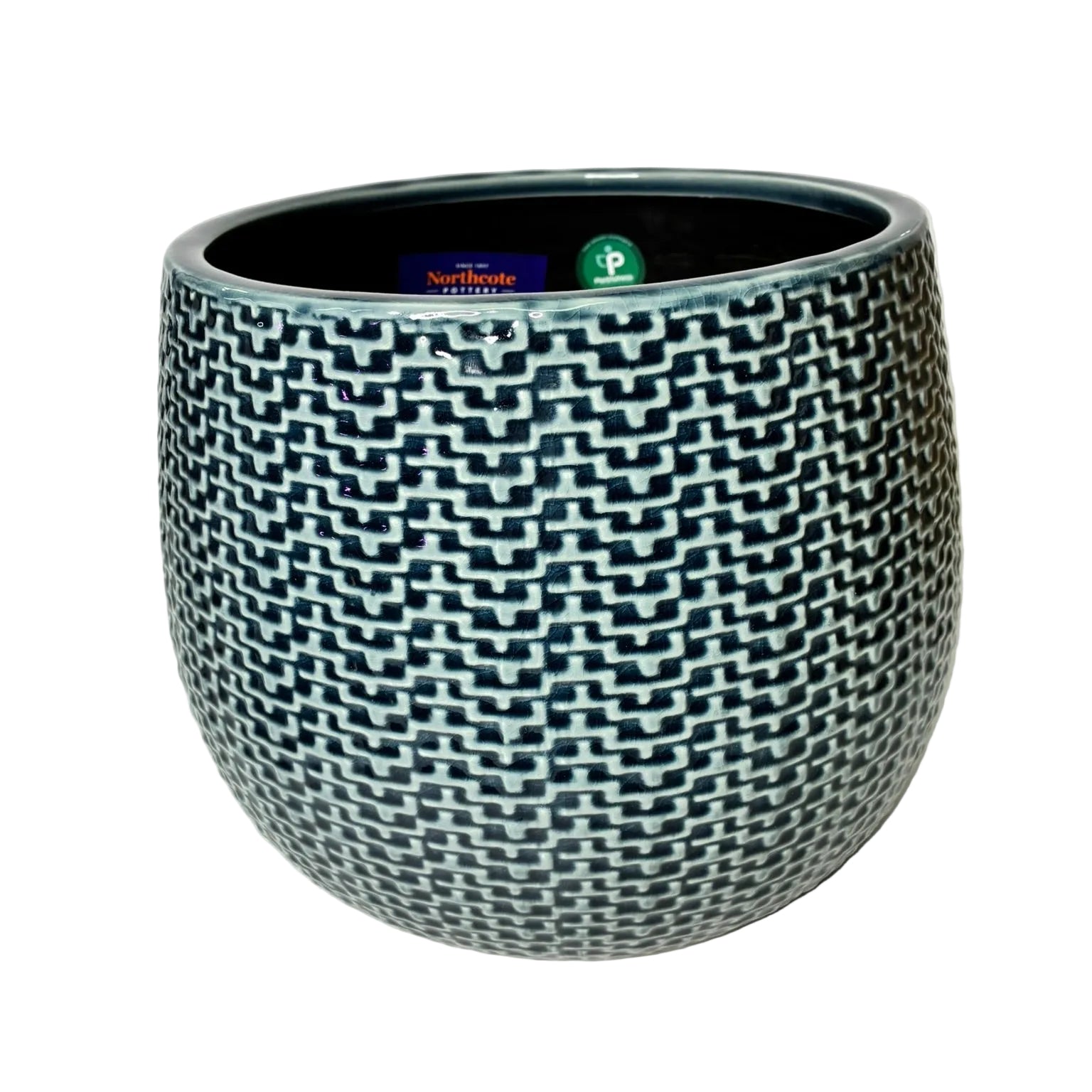 A round ceramic planter pot with a textured geometric pattern in dark teal and white, photographed against a plain white background.