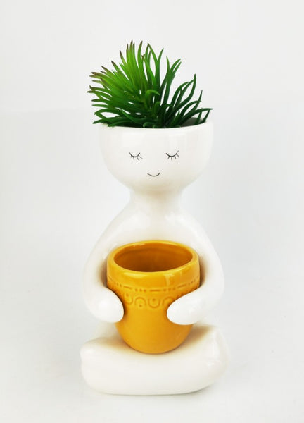 Person Holding a Pot Planter Mustard